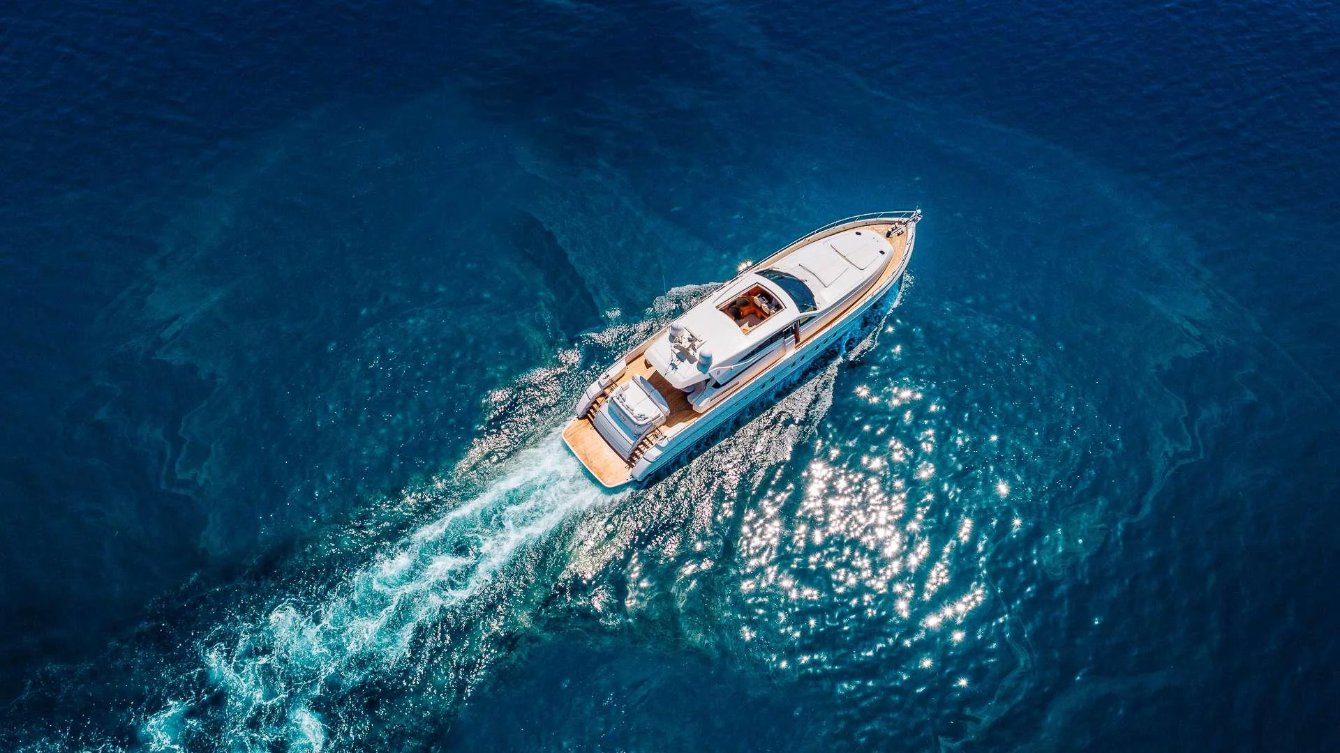 a boat in the ocean aboard CAMY Yacht for Charter