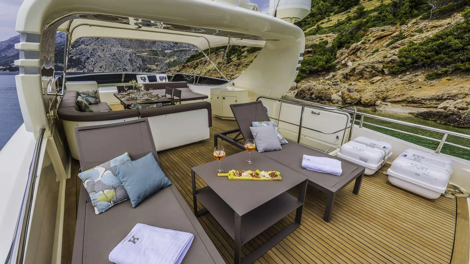 a room with a table and chairs aboard KARISMA Yacht for Charter