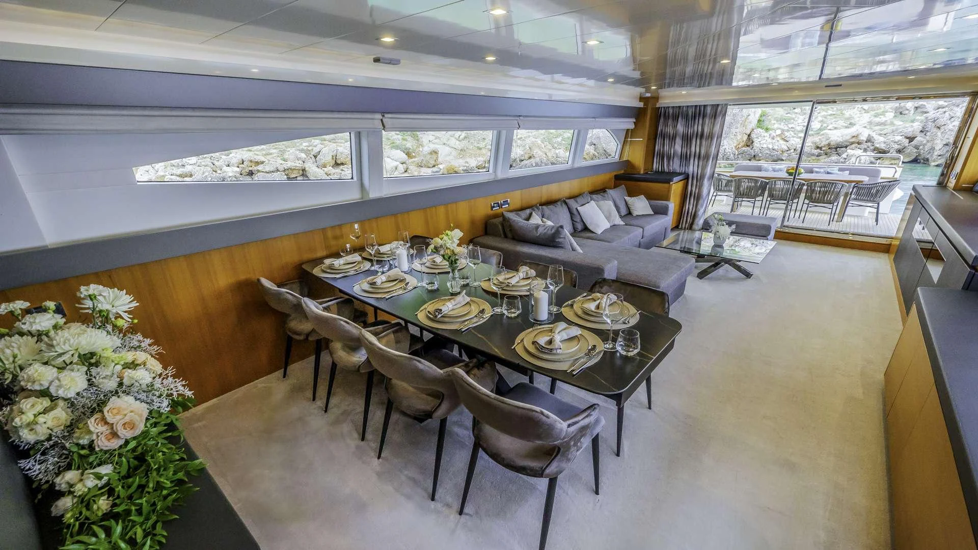 a dining room with a table and chairs aboard KARISMA Yacht for Charter