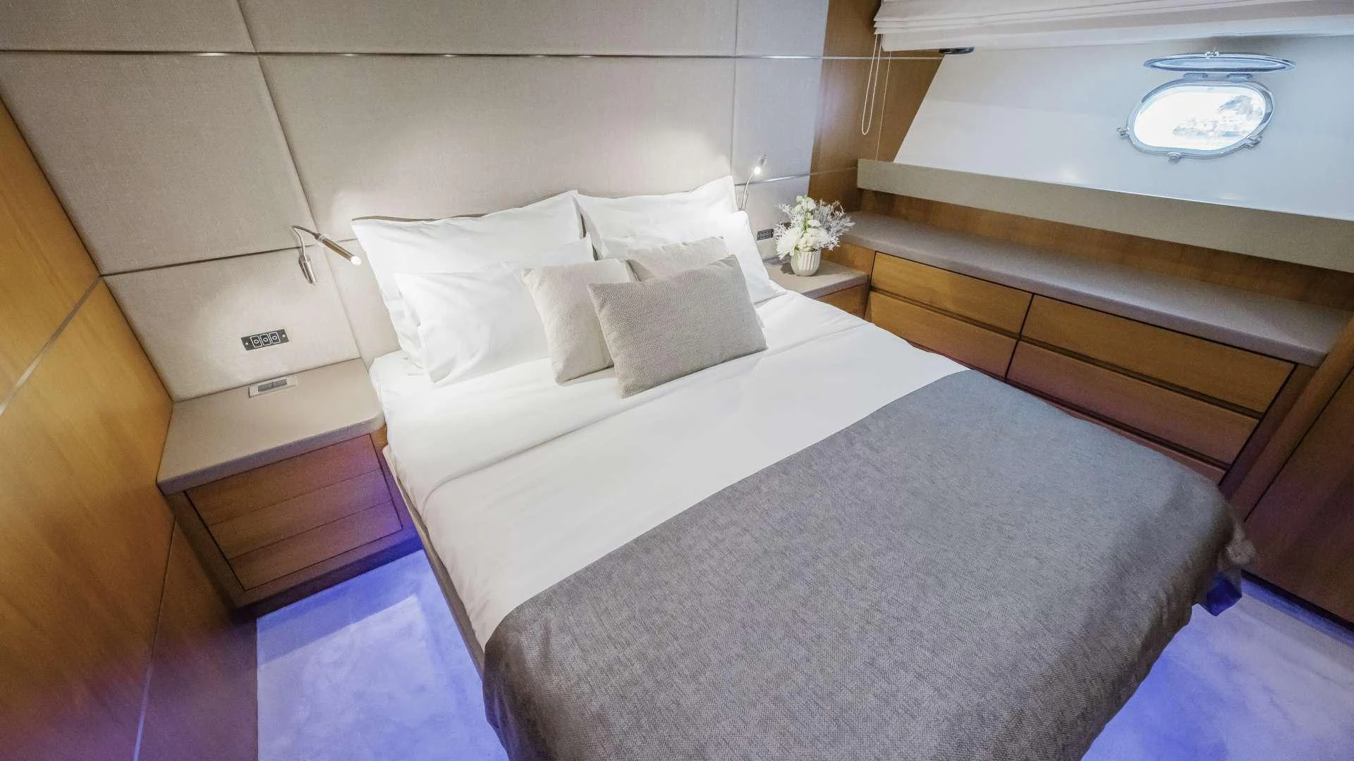 a bed with white sheets aboard KARISMA Yacht for Charter