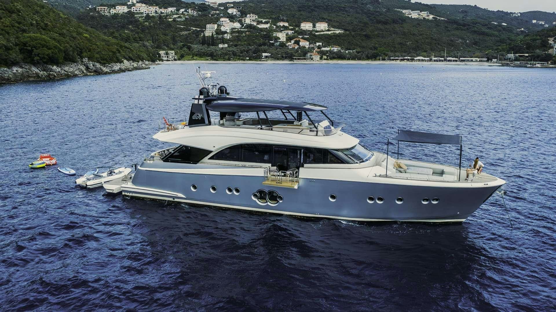 a white boat in the water aboard GIORGIO Yacht for Charter