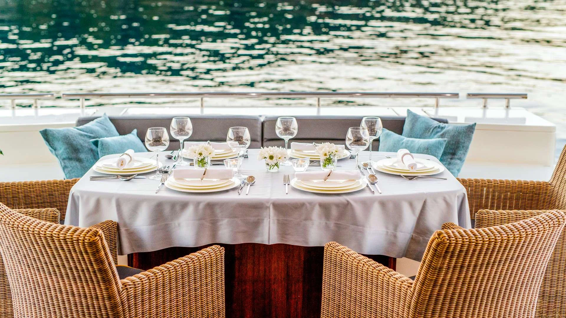 a table set for a dinner aboard ORLANDO L Yacht for Charter