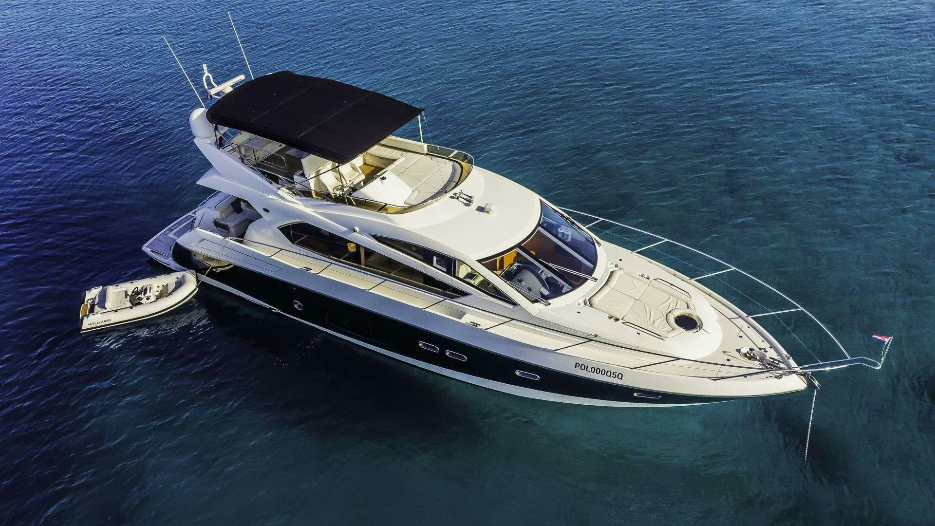 a boat on the water aboard 2 DRUNK Yacht for Charter