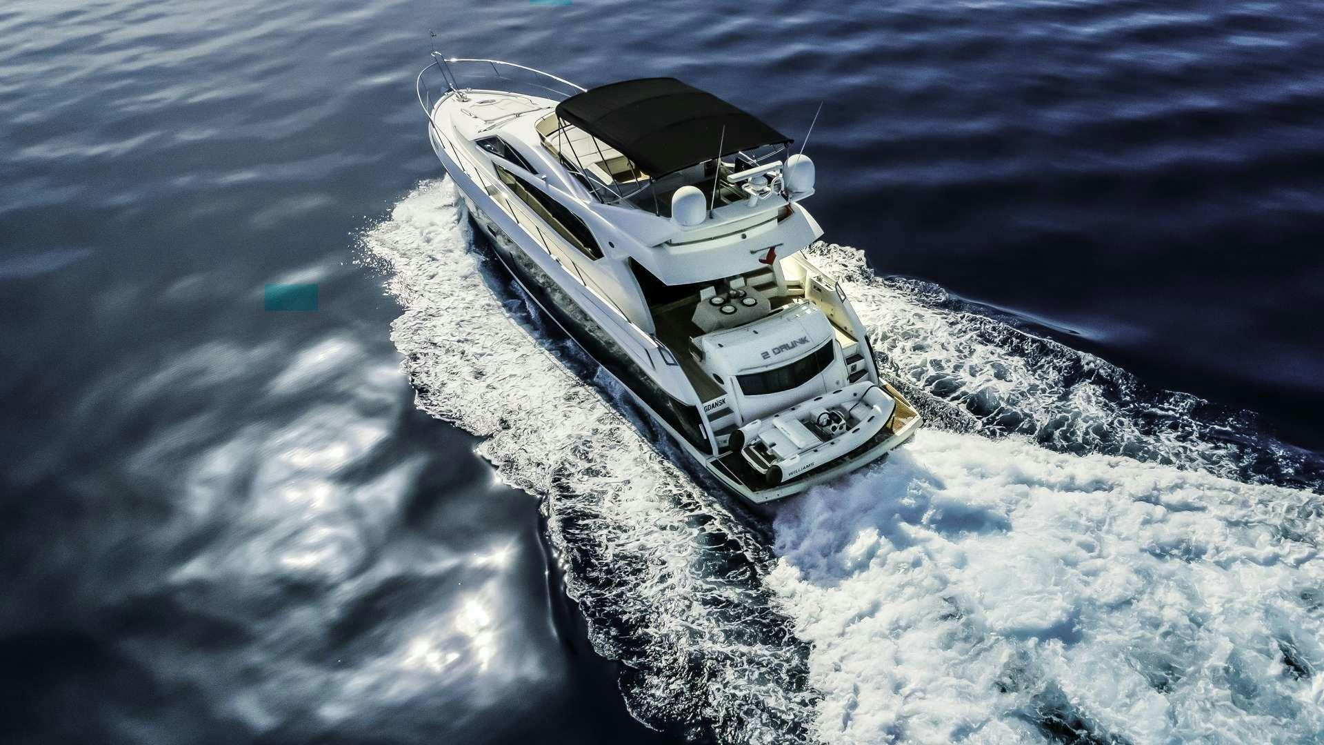 a space shuttle above the earth aboard 2 DRUNK Yacht for Charter