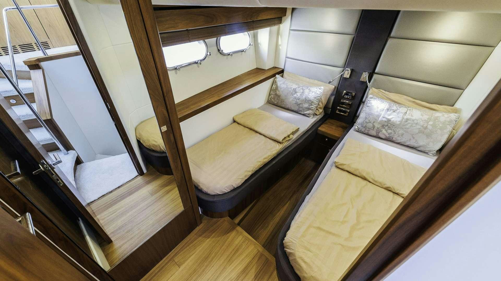a room with bunk beds aboard 2 DRUNK Yacht for Charter