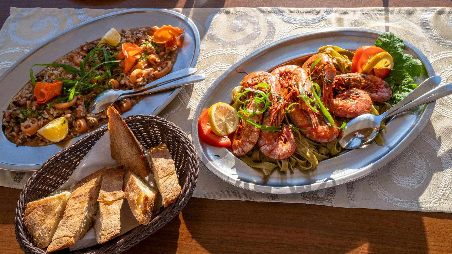 a couple of plates of food aboard CLOUD 9 Yacht for Charter