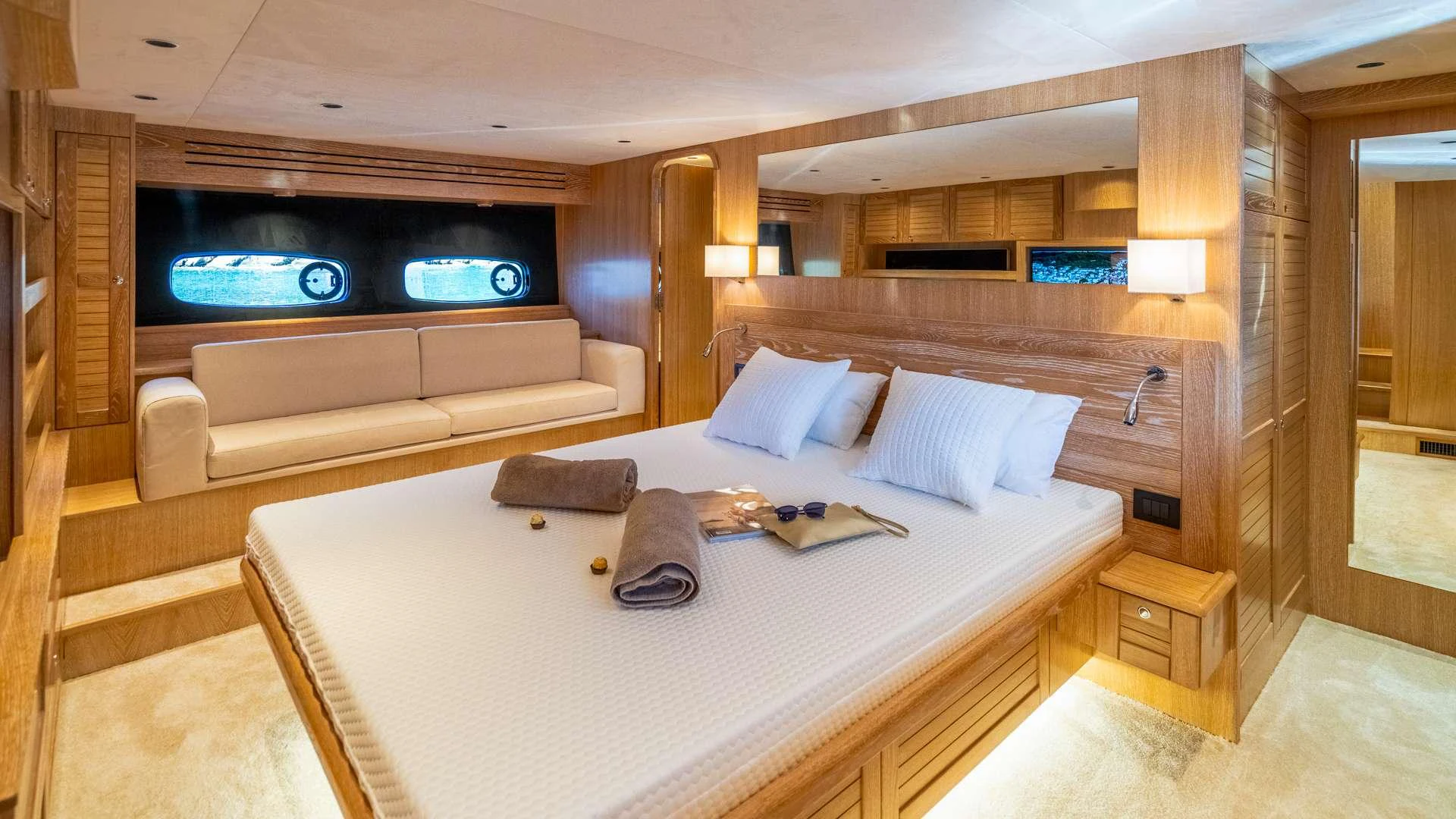 a large bed in a room aboard CLOUD 9 Yacht for Charter