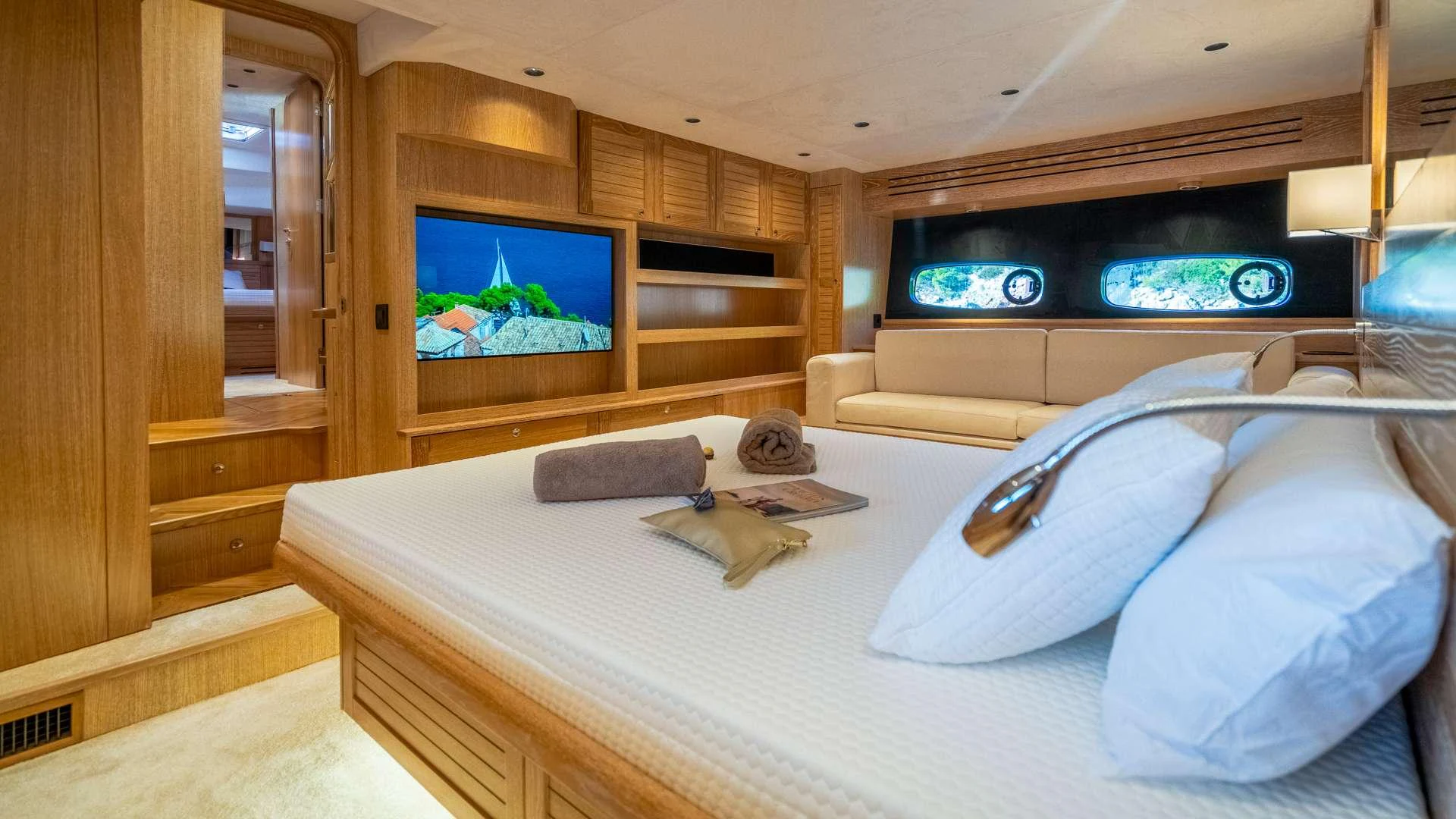 a bed in a room aboard CLOUD 9 Yacht for Charter