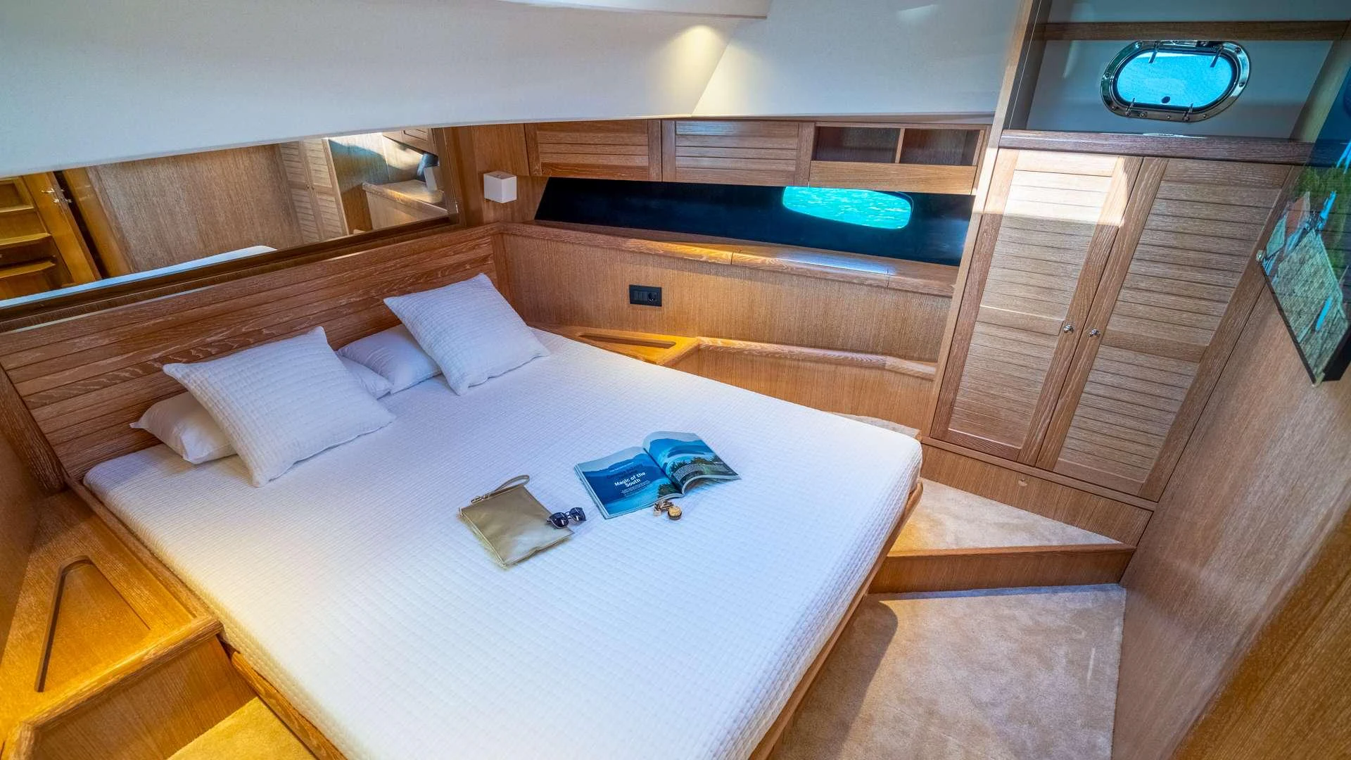 a bed in a room aboard CLOUD 9 Yacht for Charter