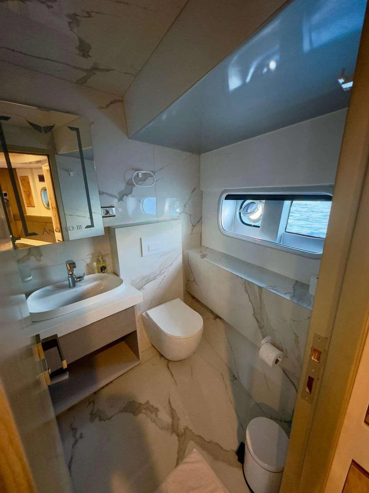 a bathroom with a sink and a toilet aboard ANGELO 3 Yacht for Charter