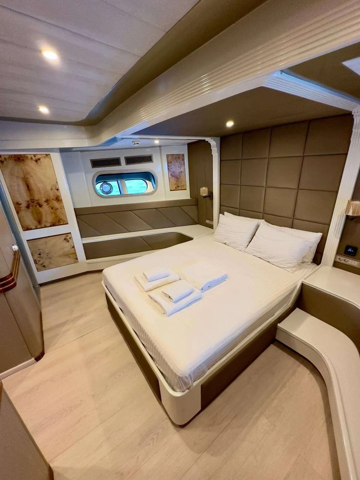 a bed in a room aboard ANGELO 3 Yacht for Charter
