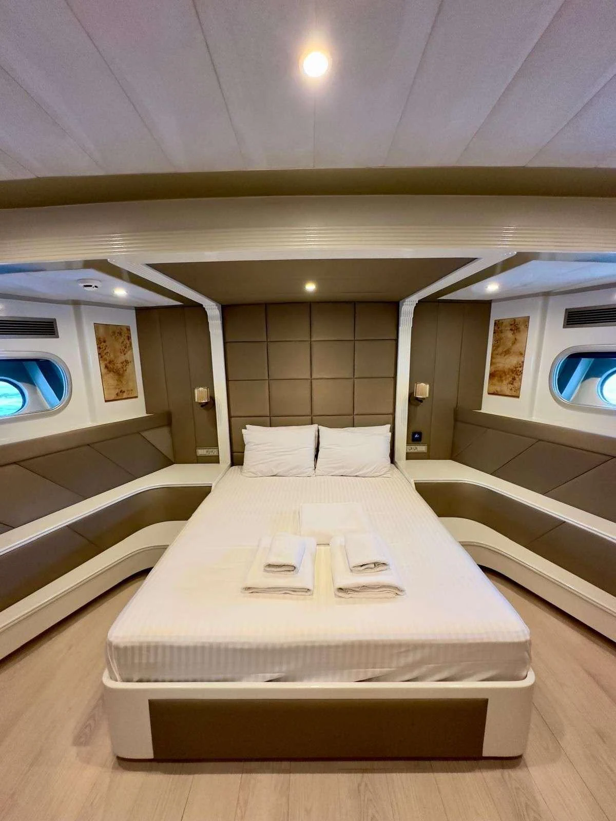 a bed in a room aboard ANGELO 3 Yacht for Charter