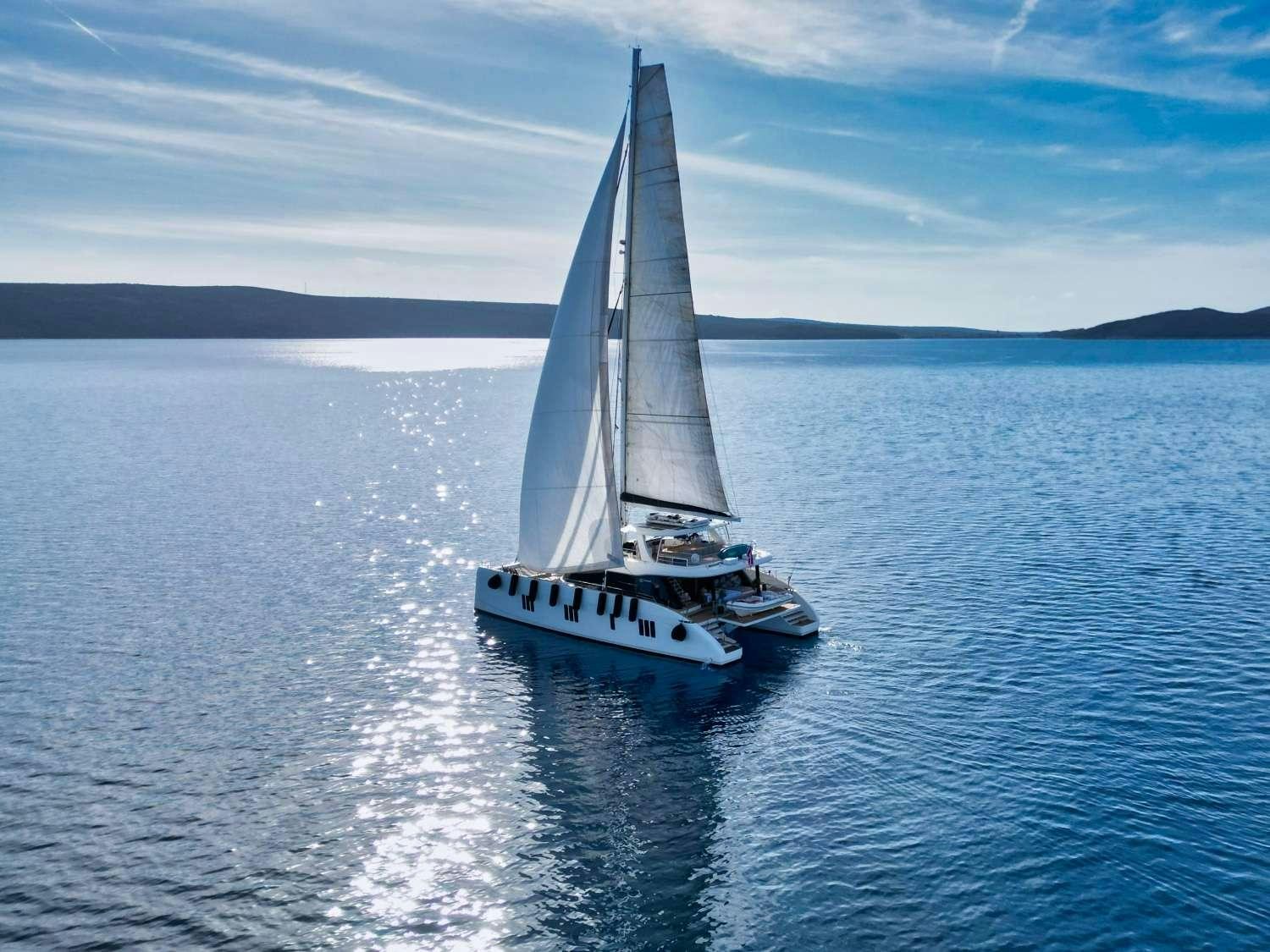 a sailboat on the water aboard HONEYBIRD Yacht for Charter
