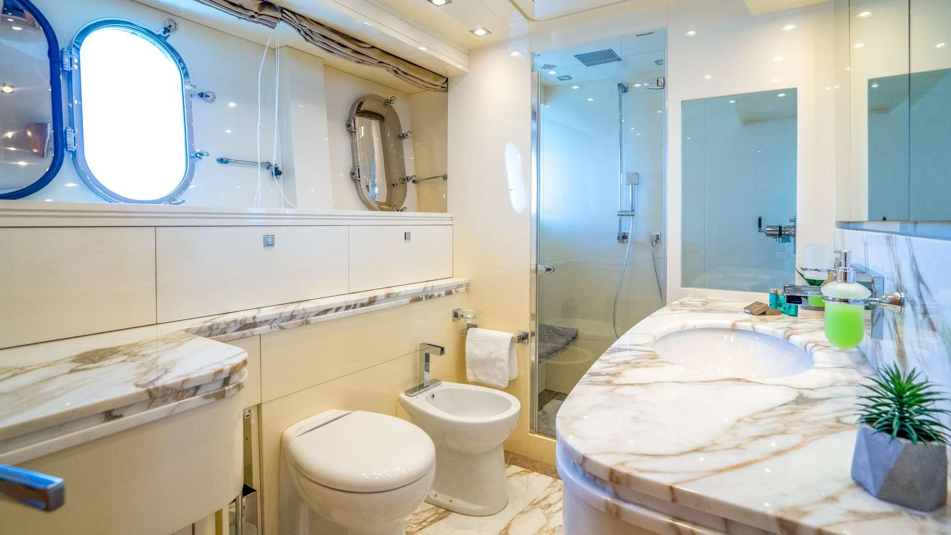 a bathroom with a large tub aboard CYNTHIA Yacht for Charter