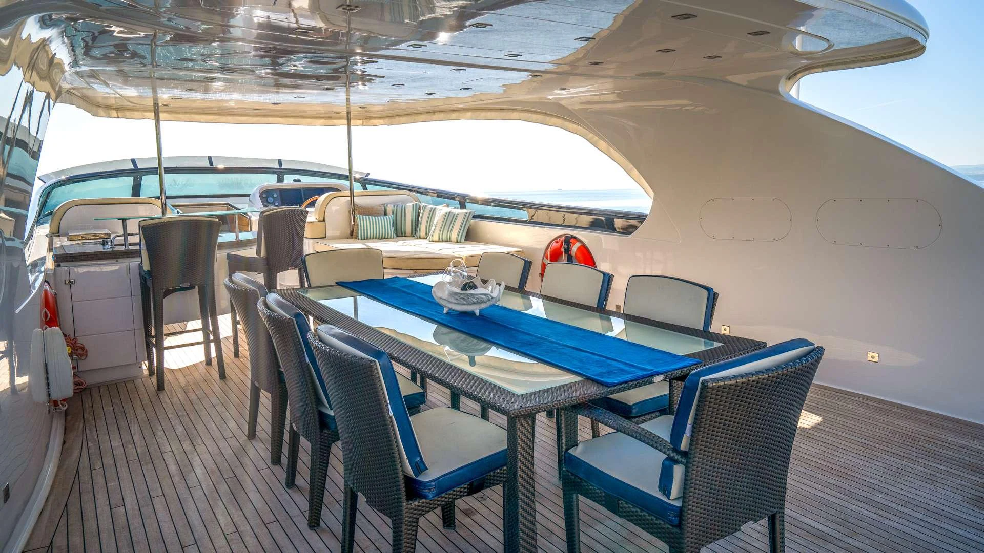 a tent with chairs and tables aboard CYNTHIA Yacht for Charter