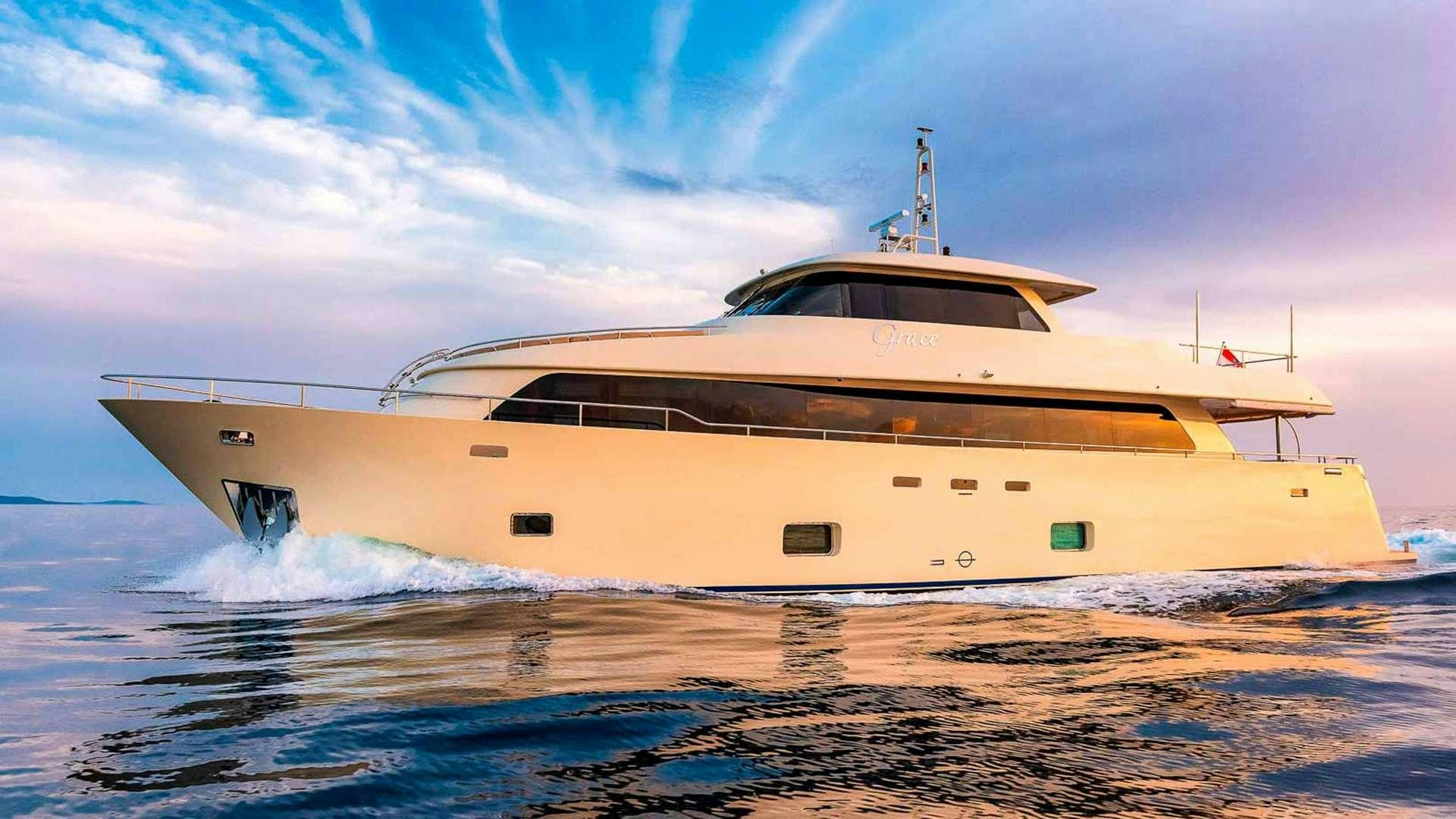 a large ship in the water aboard GRACE Yacht for Charter