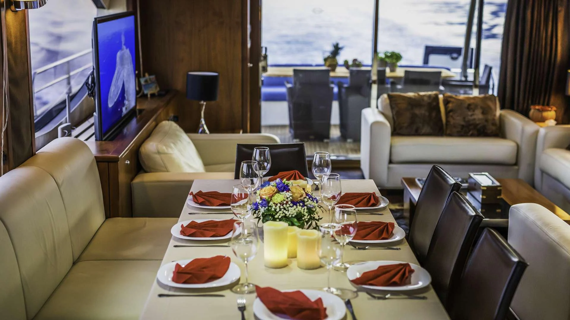 a table with plates and food on it aboard THE BEST WAY Yacht for Charter