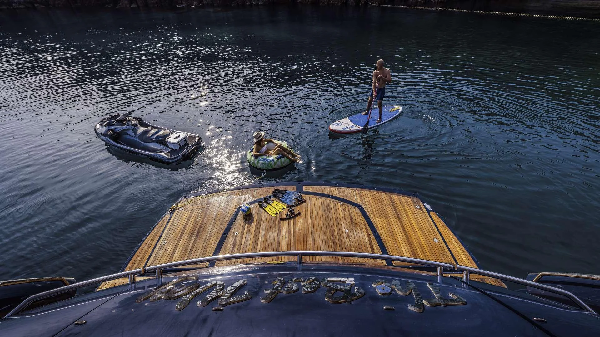 a person and a dog on a boat in the water aboard THE BEST WAY Yacht for Charter