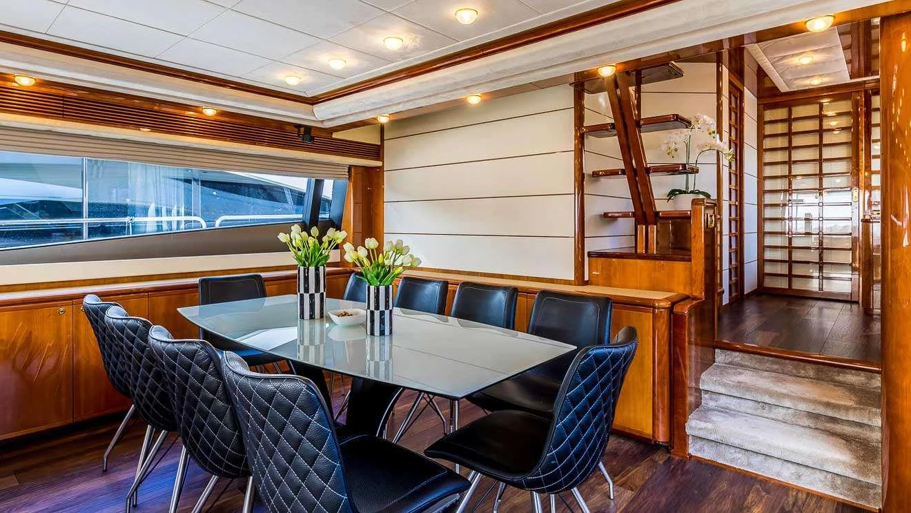 a room with a table and chairs aboard KATARIINA Yacht for Charter