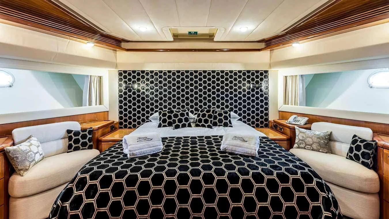 a room with a couple of beds aboard KATARIINA Yacht for Charter