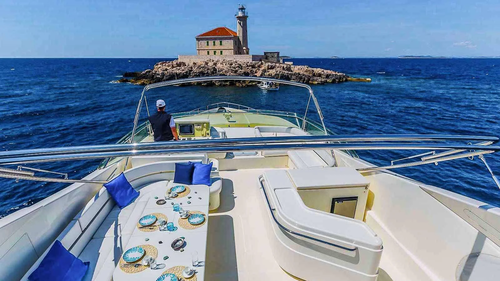 a couple of men on a boat aboard KATARIINA Yacht for Charter