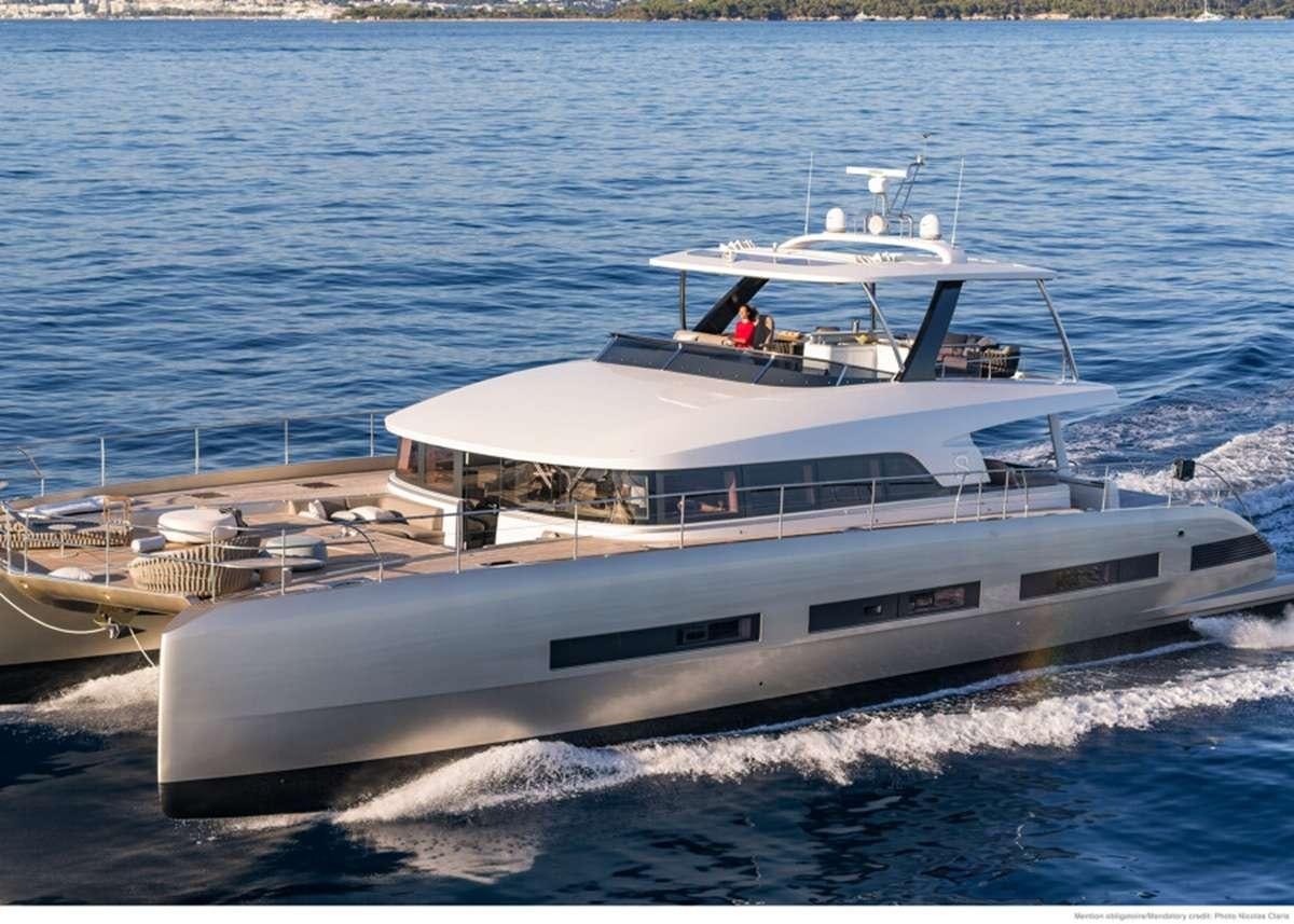 a white yacht on the water aboard JAN'S FELINE Yacht for Charter