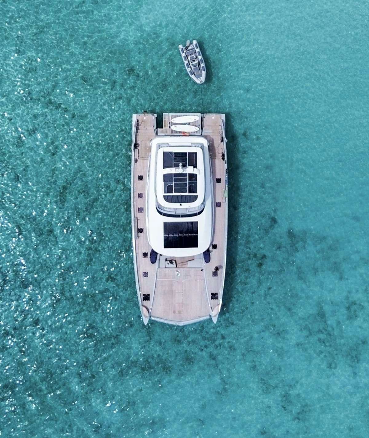 a silver and black object on a green surface aboard JAN'S FELINE Yacht for Charter