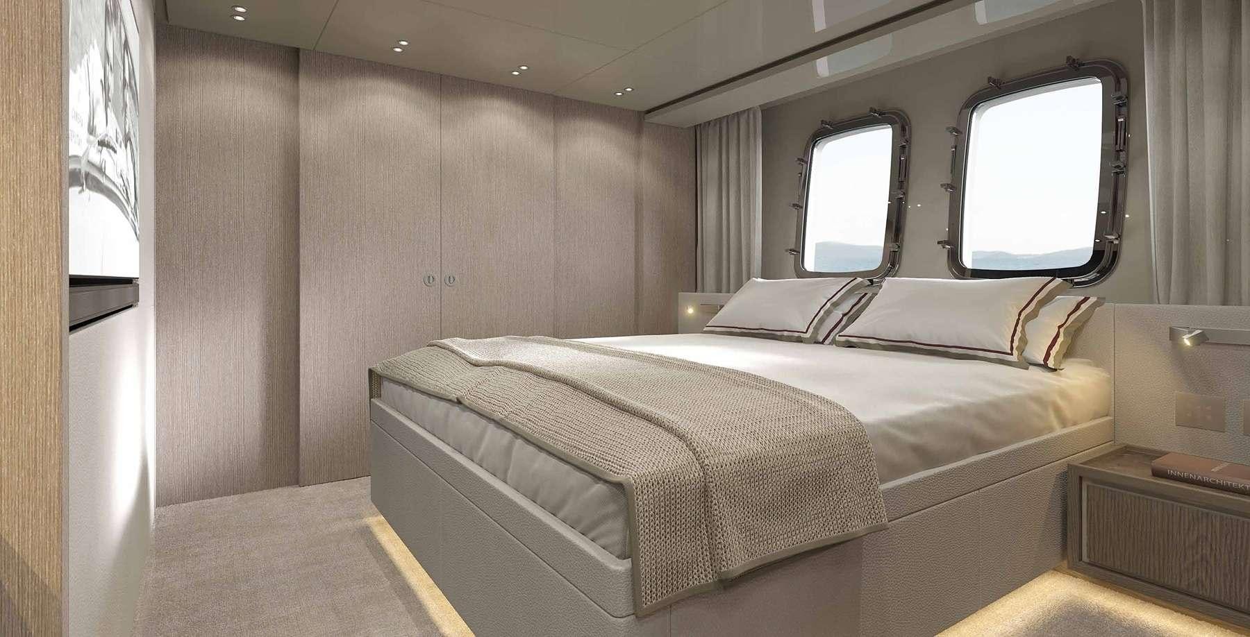 a room with a bed and a window aboard SENSA Yacht for Charter