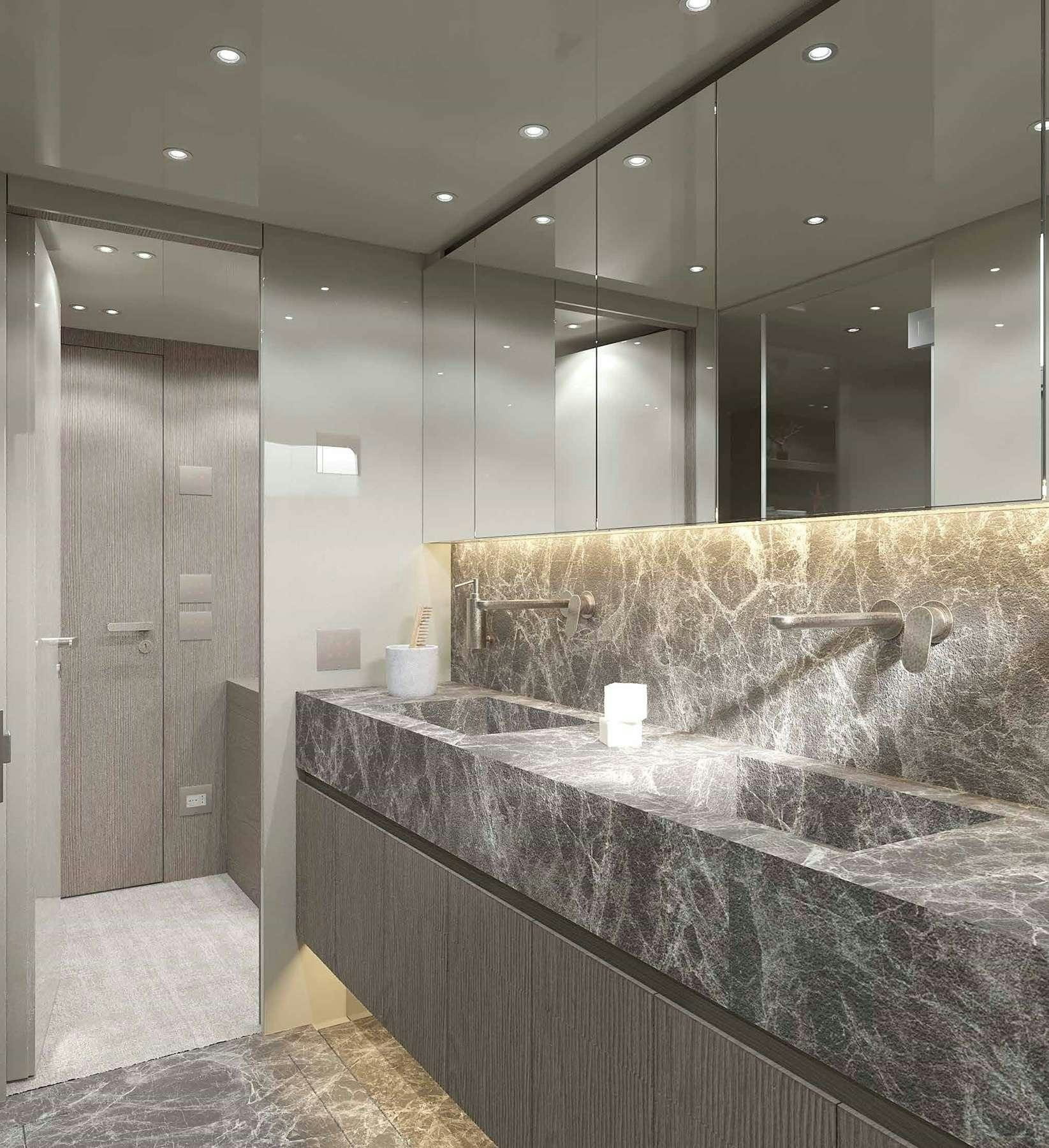 a bathroom with marble counter tops aboard SENSA Yacht for Charter