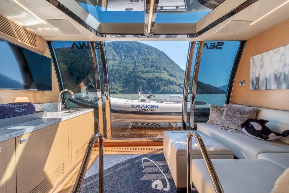 a train with a view of the mountains aboard VOYAGER Yacht for Charter