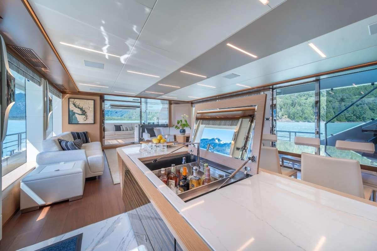a modern looking living room aboard VOYAGER Yacht for Charter