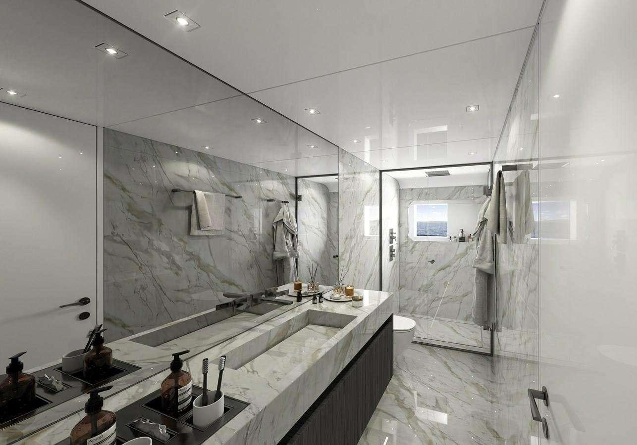 a bathroom with a large mirror aboard ADA 50 Z/01 Yacht for Charter