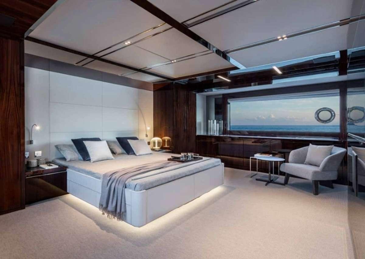 a large bedroom with a large bed aboard BELLA DONNA Yacht for Charter