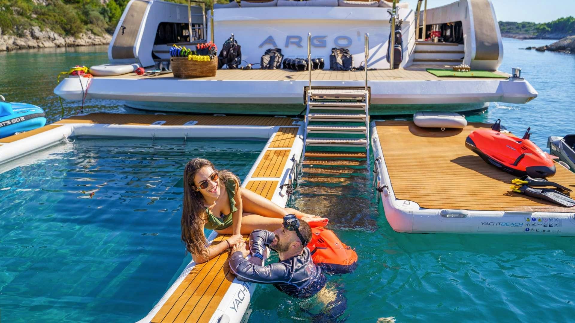a person lying in a pool aboard ARGO Yacht for Charter
