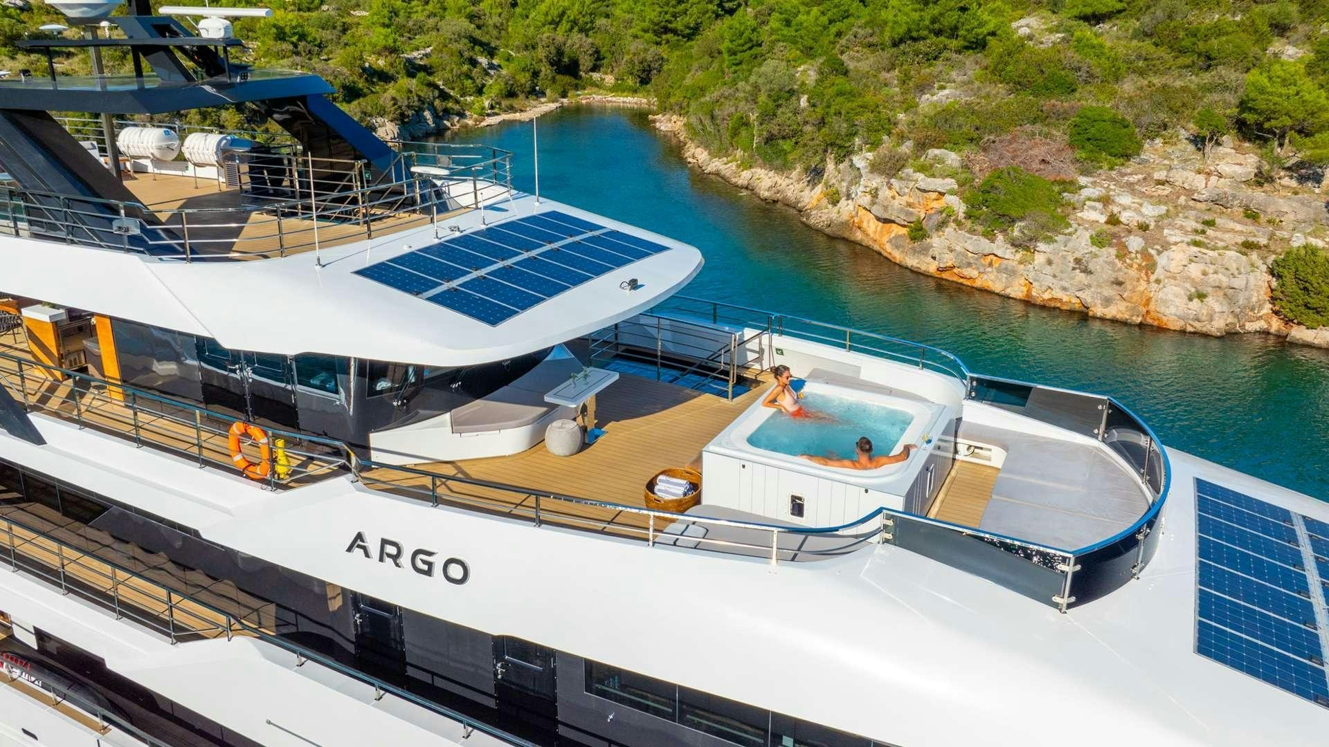 a boat docked at a pier aboard ARGO Yacht for Charter