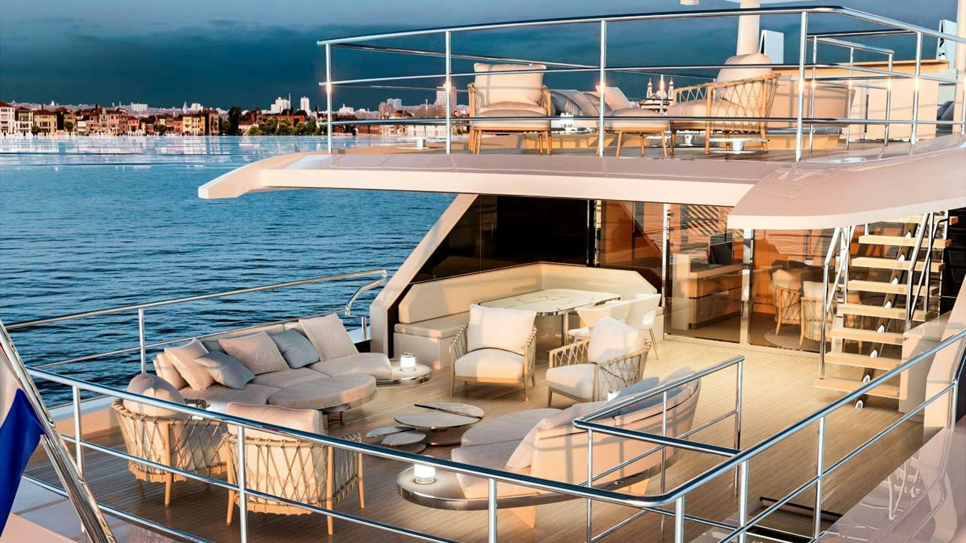 a deck with a view of a city and water aboard RENATA Yacht for Charter