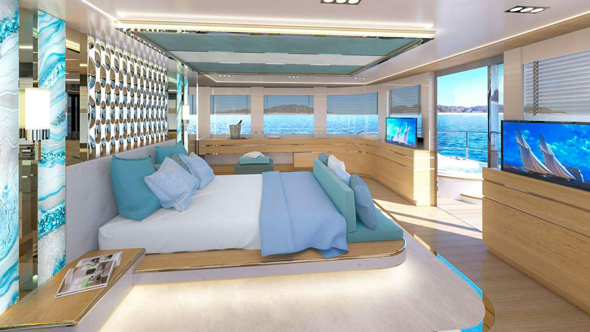 a large bed in a room aboard RENATA Yacht for Charter