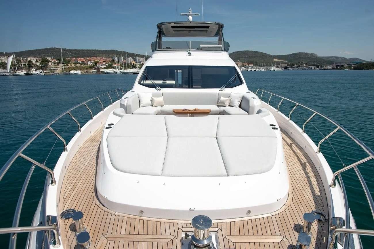 a white boat on a boat aboard PREWI Yacht for Charter