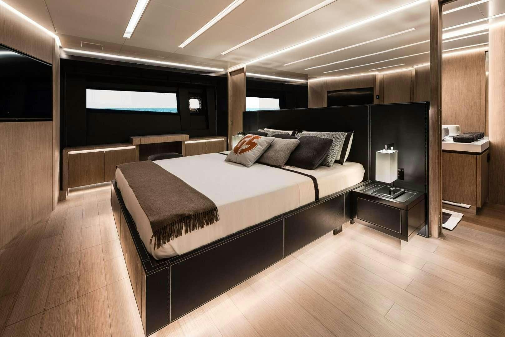 a bed in a room aboard G-FIVE Yacht for Charter