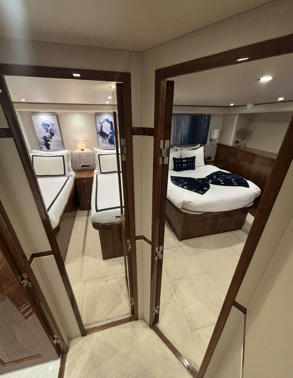 a bathroom with a large mirror aboard INDIGO Yacht for Charter