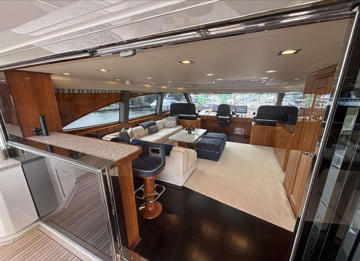 a large room with a large window aboard INDIGO Yacht for Charter