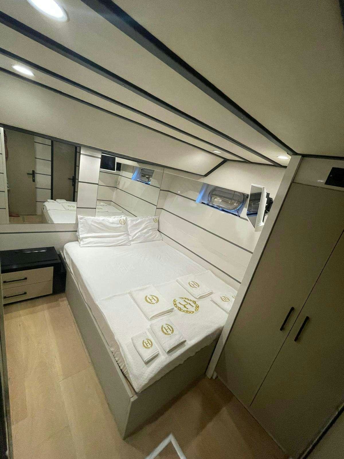 a bathroom with a sink and cabinets aboard BEYEFENDI H Yacht for Charter