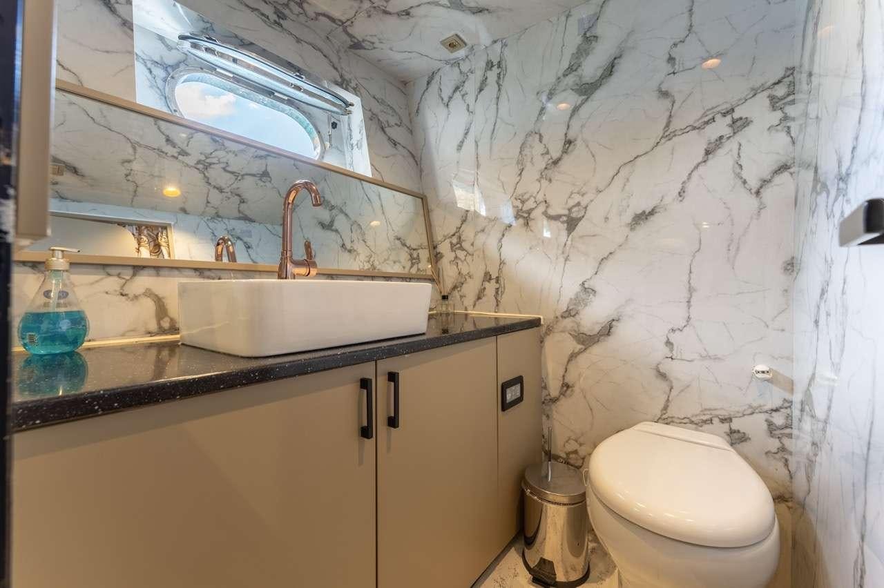 a bathroom with a sink and a toilet aboard BEYEFENDI H Yacht for Charter