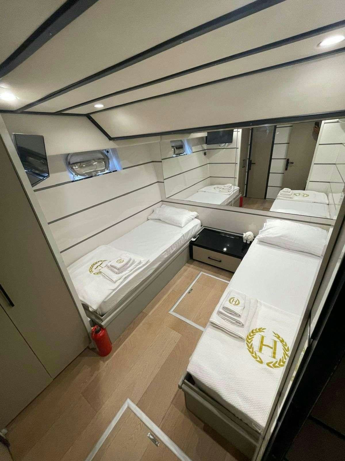 a bathroom with a large mirror aboard BEYEFENDI H Yacht for Charter