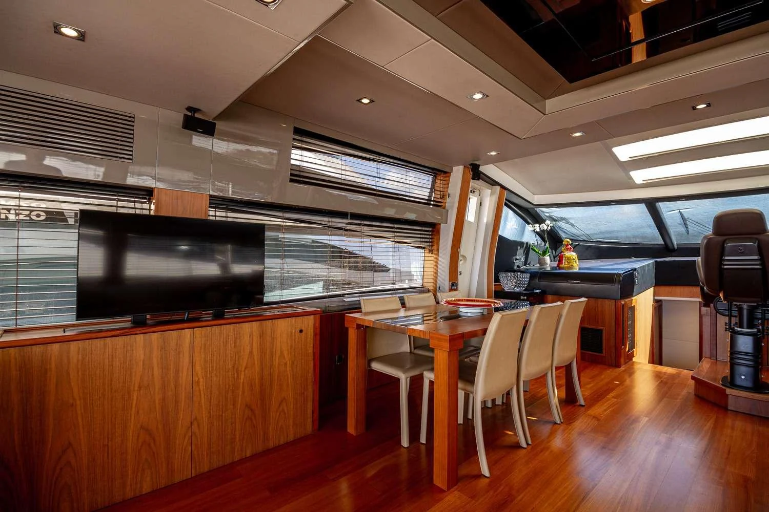 a room with a table and chairs aboard BASAD Yacht for Charter