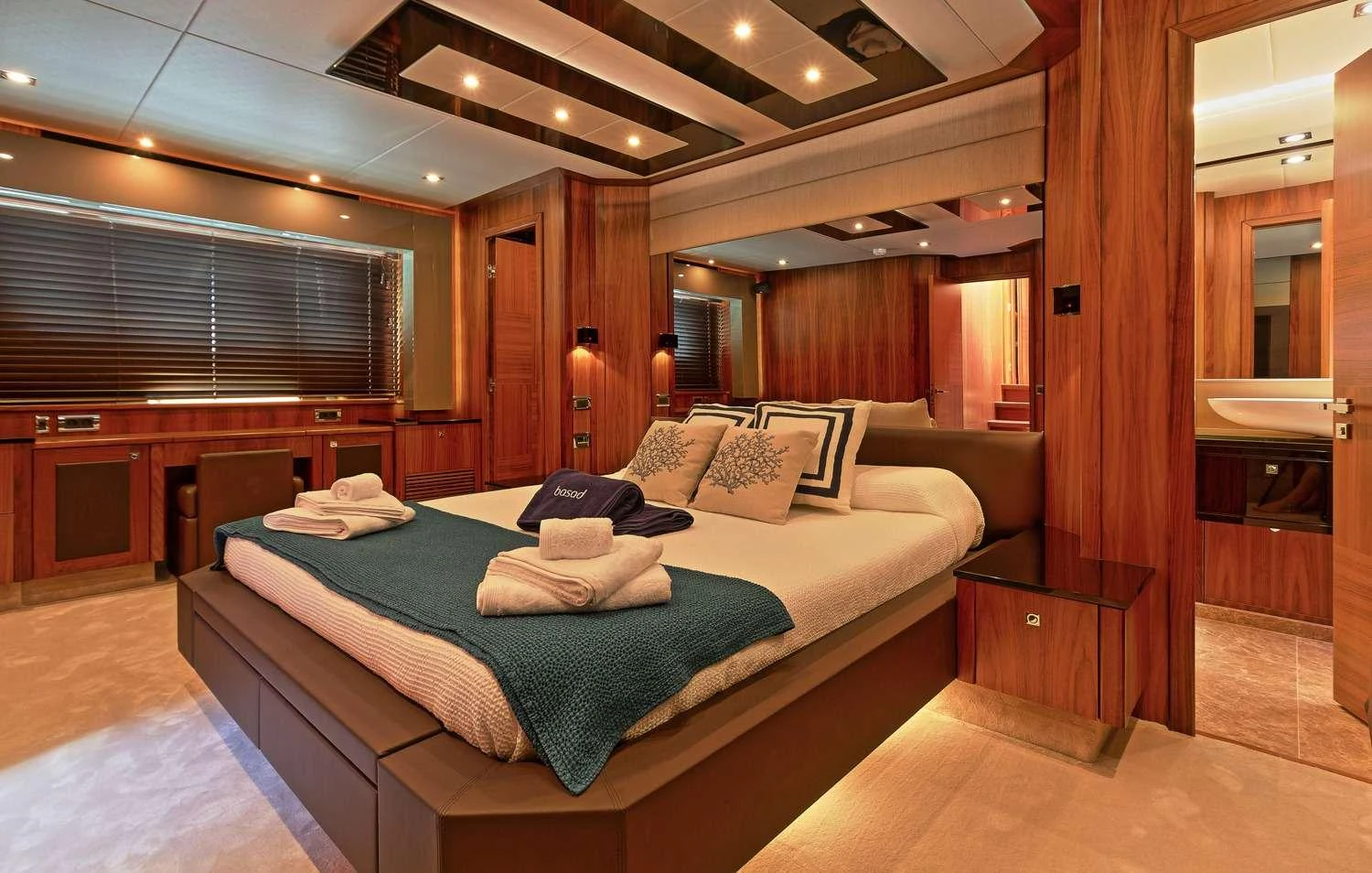 a bed in a room aboard BASAD Yacht for Charter