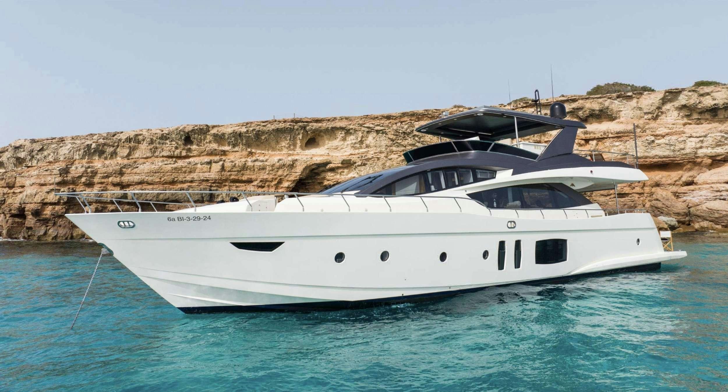 a white yacht in the water aboard BISCAYNE Yacht for Charter