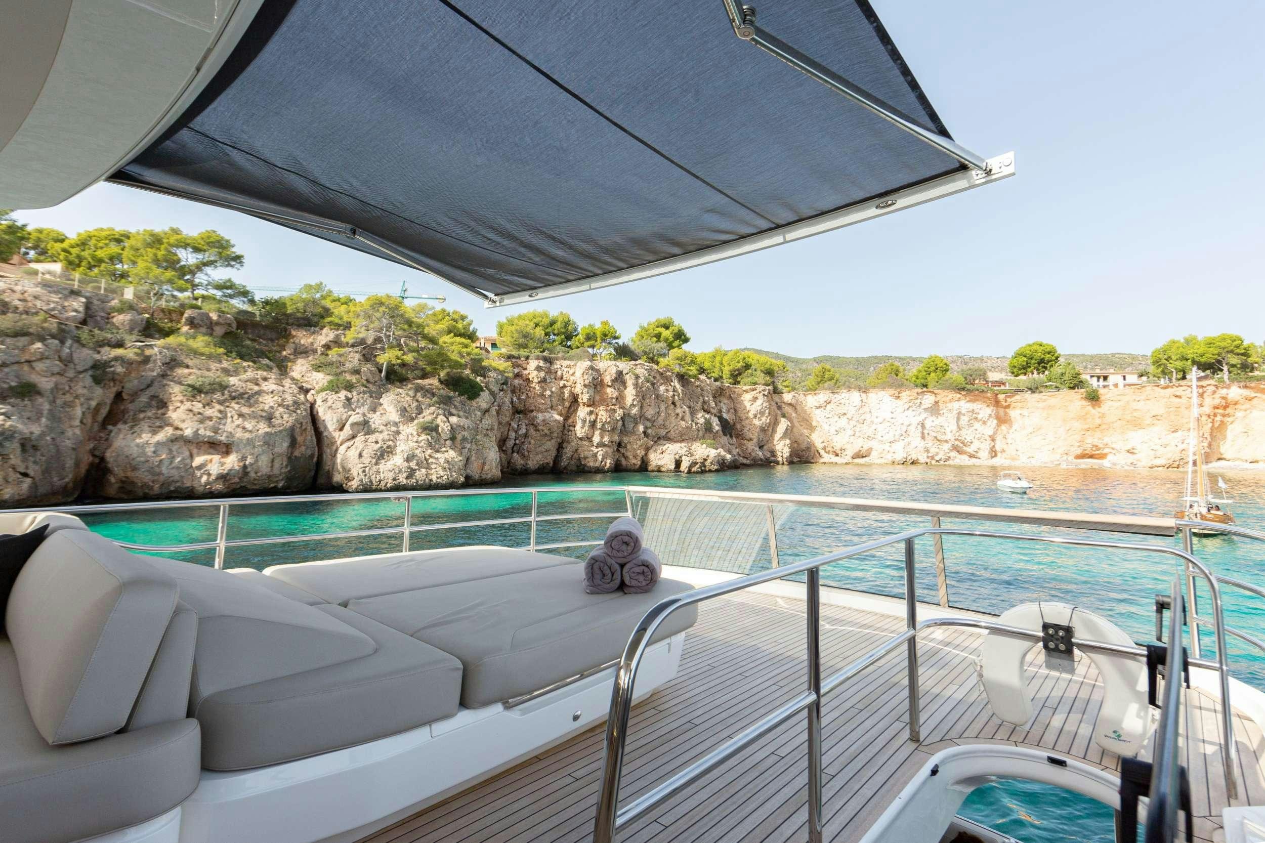 a person sitting on a boat aboard MIO BARCO Yacht for Charter