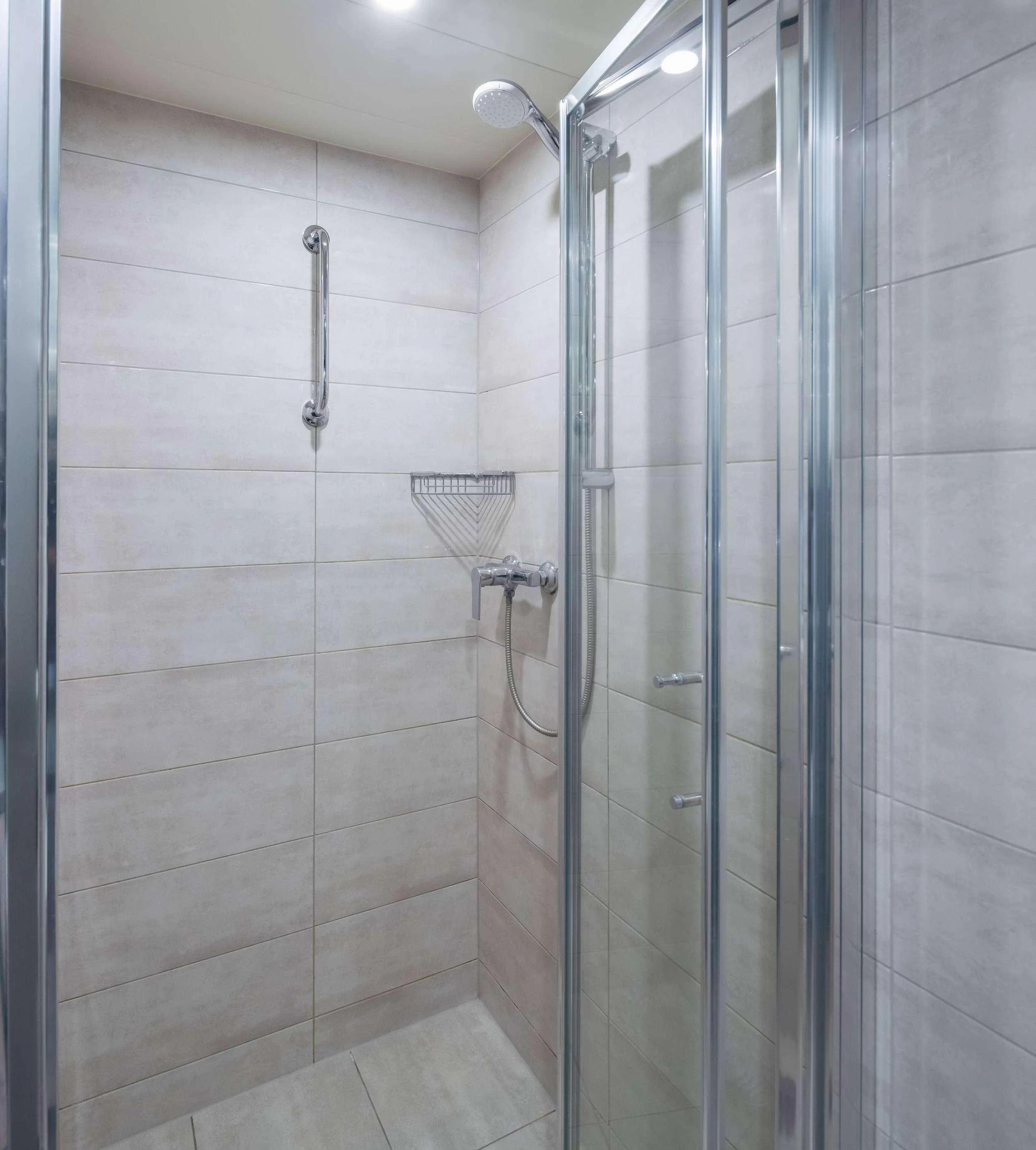 a shower unit in a bathroom aboard AMALIA Yacht for Charter
