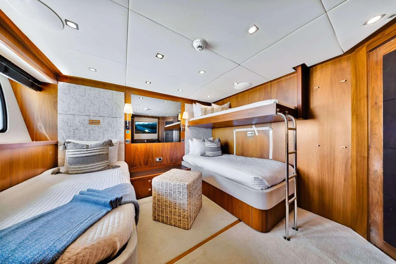 a room with bunk beds aboard NATURAL 9 Yacht for Charter